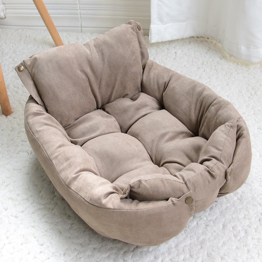 Beige convertible pet bed in a cozy home setting – a comforting solution to eliminate your pet’s discomfort with hard surfaces, providing a plush, stylish spot for napping that fits seamlessly into your living space.