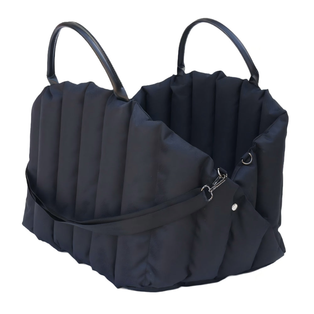 Sleek black padded pet carrier with sturdy handles, ideal for safe and comfortable car travel with small dogs or cats