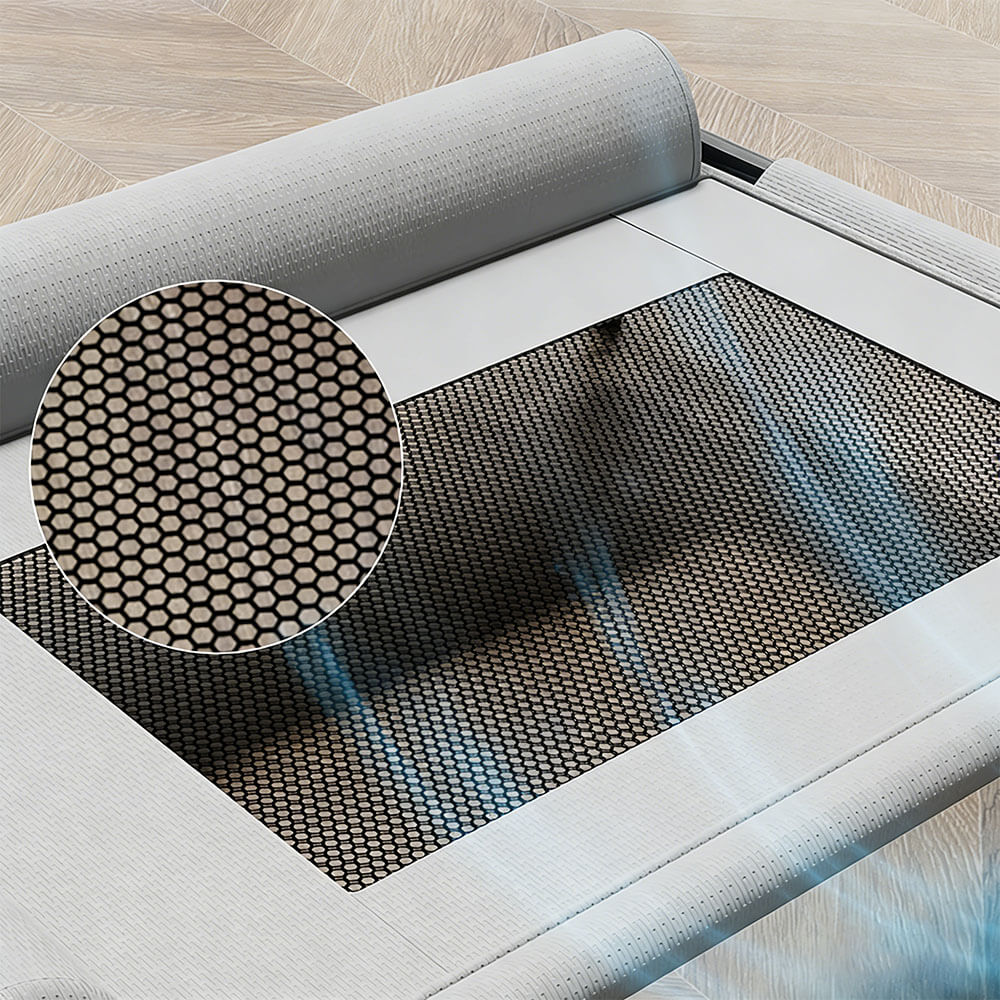 Close-up of the breathable hexagonal mesh fabric on the elevated pet cot, showing the removable, washable design that promotes air circulation and keeps pets cool.
