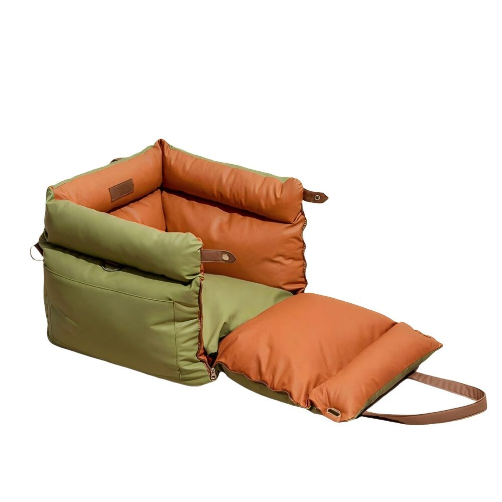 Expanded view of a convertible olive green and orange pet car seat carrier, displaying its dual functionality as a secure car seat and an extended cushion, providing extra space for pets to stretch during long journeys.