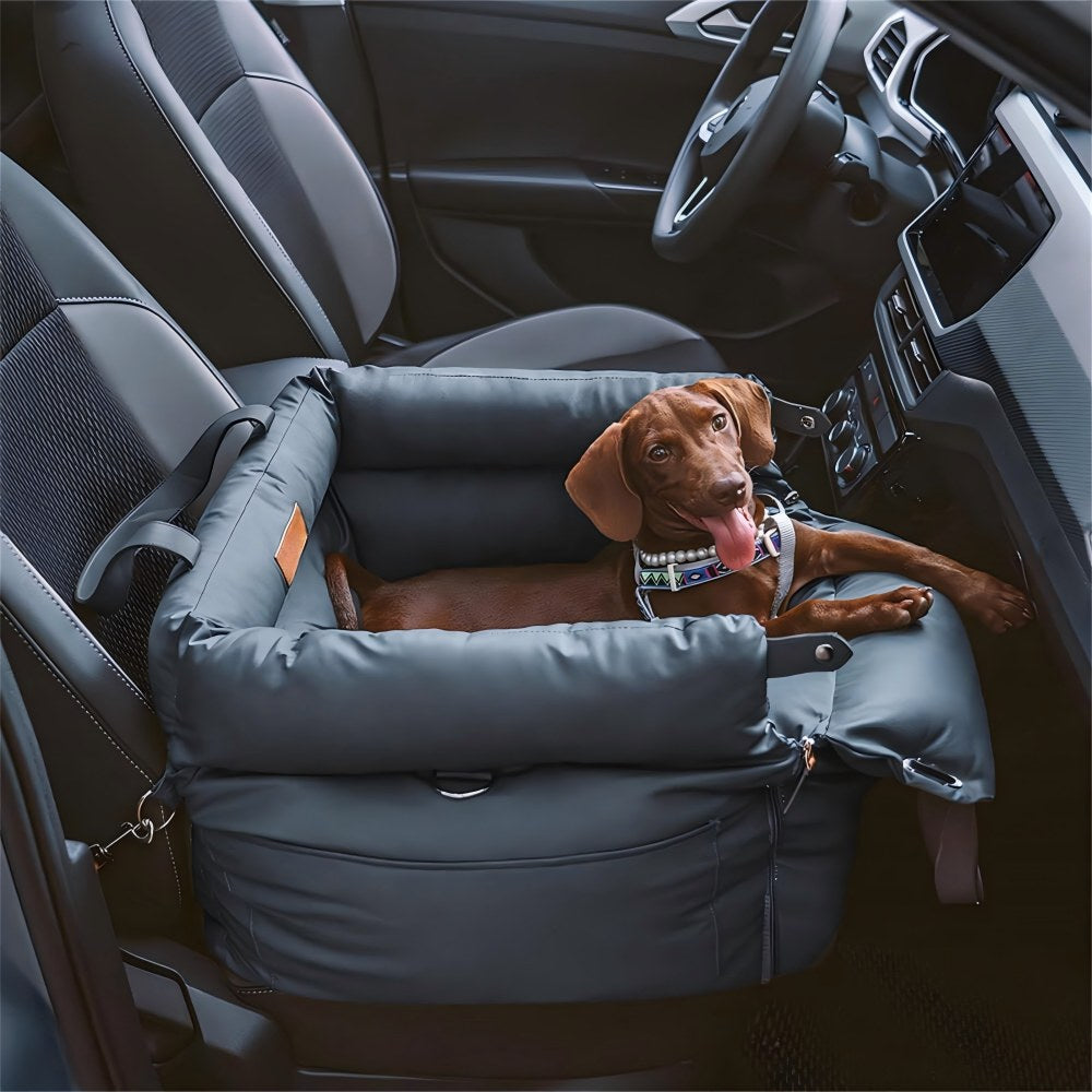 A happy medium-sized brown dog relaxing in a Navy Blue multifunctional pet car seat carrier in the front car seat, showcasing spacious padding, reinforced edges, and safety straps to keep pets secure during travel.