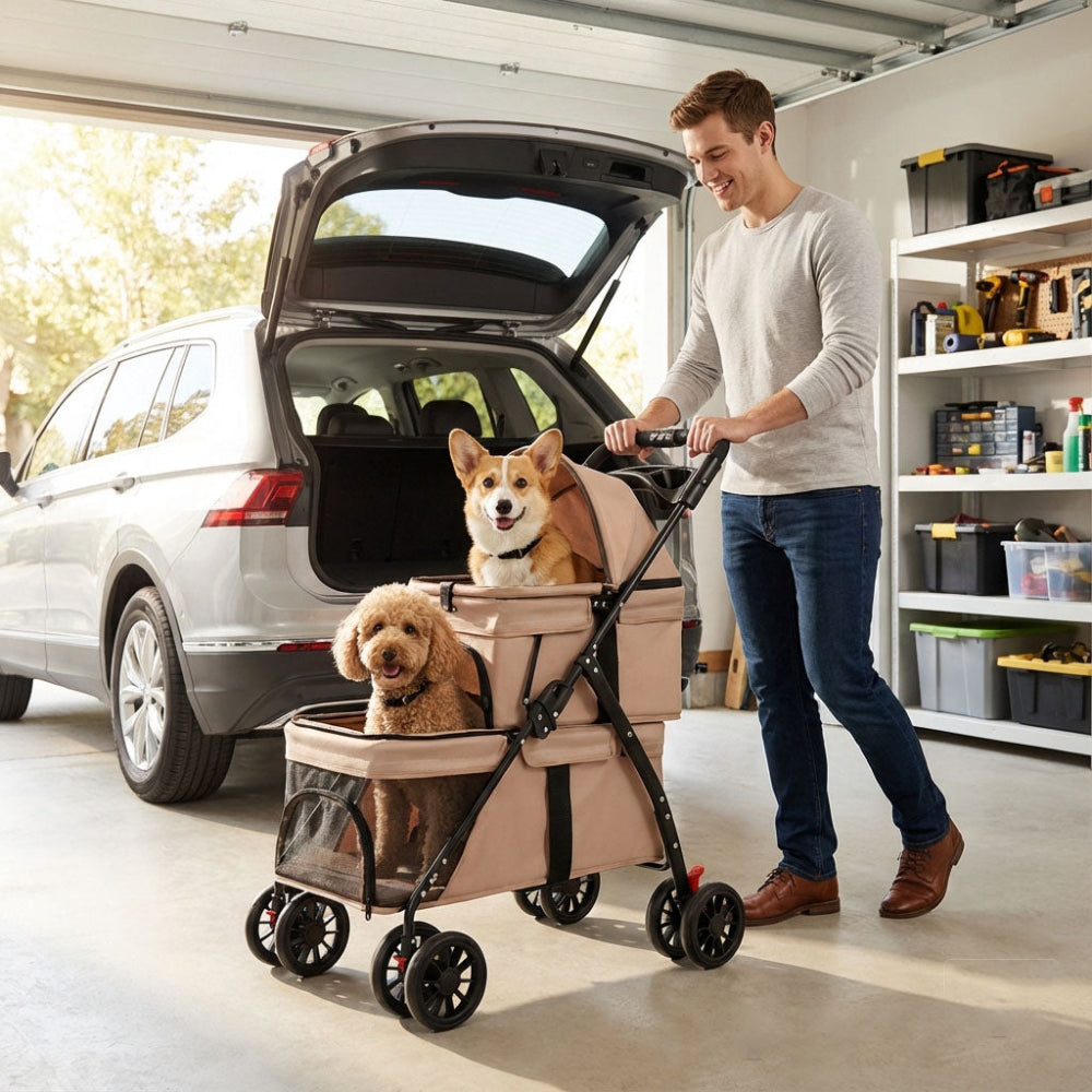 Double-decker pet stroller with two dogs (Corgi + Poodle) being loaded into a car trunk – a convenient solution to eliminate the stress of traveling with multiple pets, easily fitting in your vehicle for family adventures.