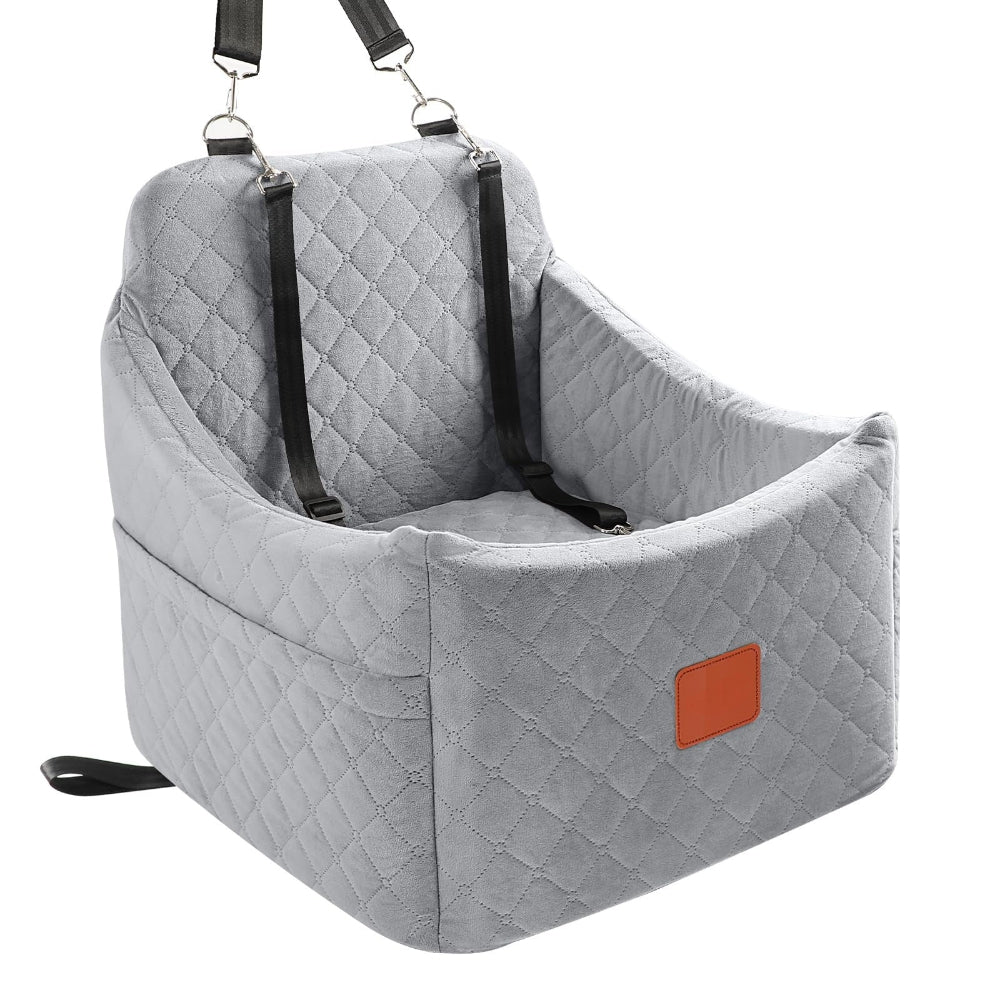 Grey quilted pet car seat with secure straps and plush construction – a stylish solution to address concerns about both looks and safety, providing a durable, attractive seat for your pet’s daily car trips.
