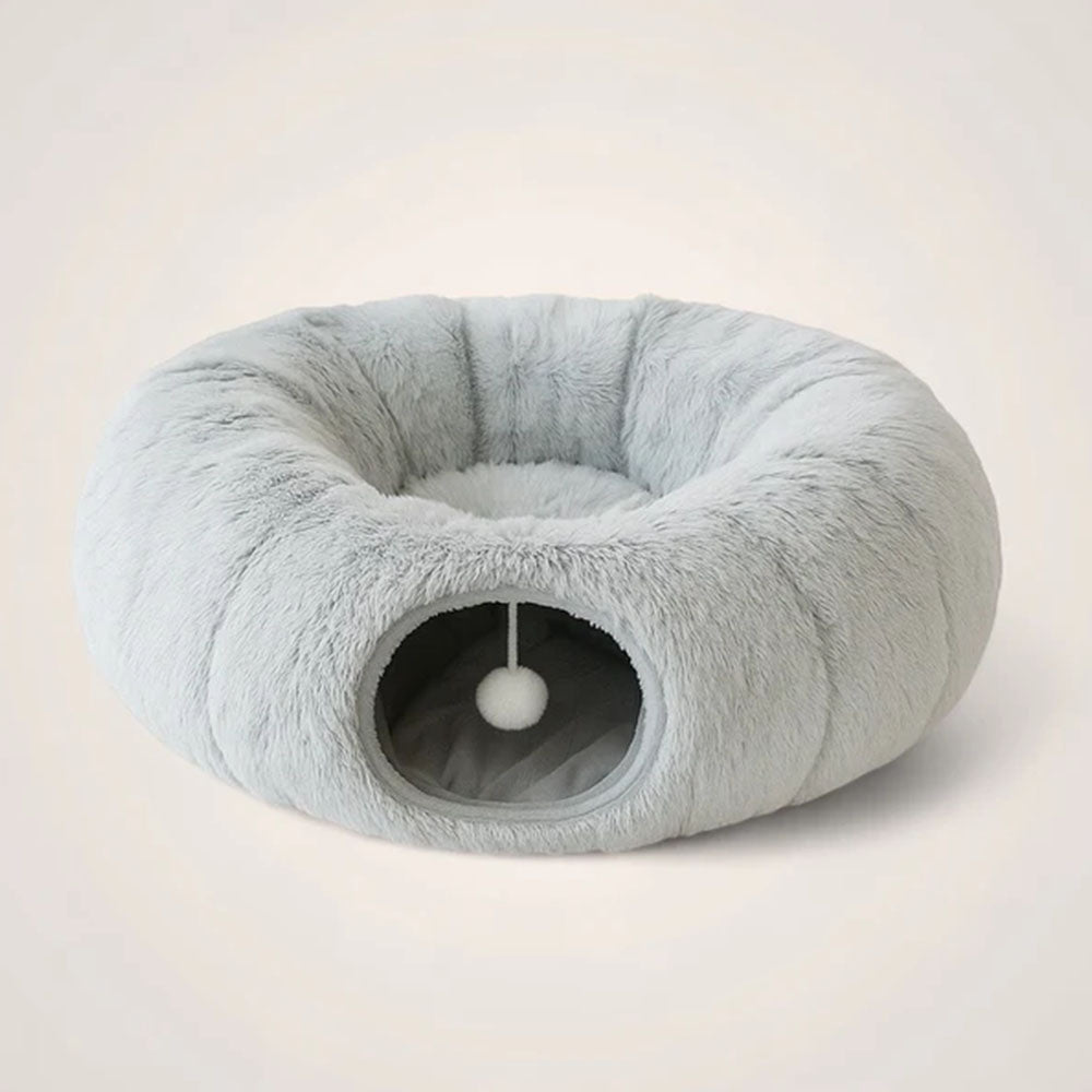 Grey plush cat bed tunnel with interactive pom-pom – a sleek, space-efficient solution that blends with modern home decor, offering your cat a cozy spot to nap, play, and feel secure.