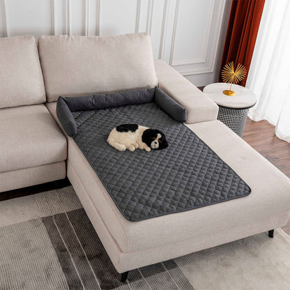 Black and white dog resting on a non-slip pet mat placed on a light-colored chaise lounge, showing secure fit, anti-slip bottom, and how it protects furniture from dirt and pet hair
