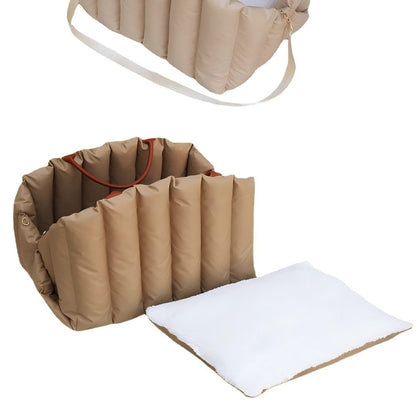 Padded pet carrier with detachable soft pad, offering a cozy resting spot for pets and hassle-free post-use cleaning
