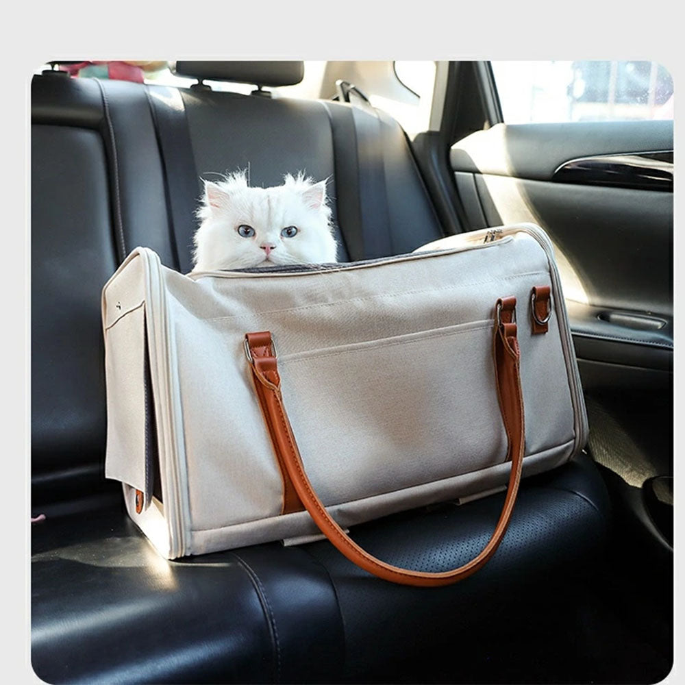 White cat in a pet carrier placed on a car backseat, designed for safe and comfortable car travel with small pets, with durable handles and secure fit.
