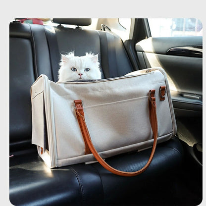 White cat in a pet carrier placed on a car backseat, designed for safe and comfortable car travel with small pets, with durable handles and secure fit.
