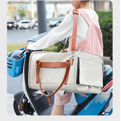 Portable pet carrier being carried on a scooter, lightweight and versatile for urban commutes, ideal for small pets on the go.
