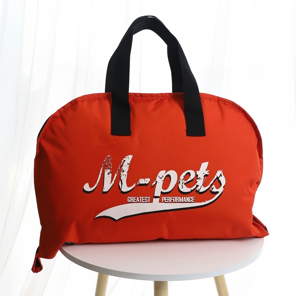 Bright red portable storage bag for waterproof outdoor pet mats, featuring heavy-duty black handles, ideal for carrying dog beds during family trips and camping excursions.