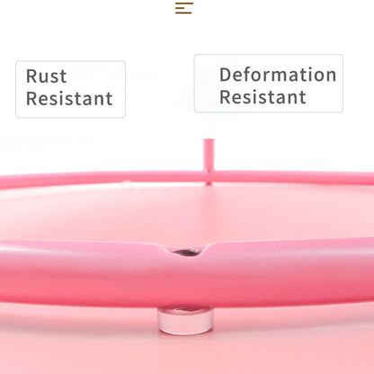 Close-up of pink steel frame of cat hammock, labeled "Rust Resistant" and "Deformation Resistant", showing durable construction for long-lasting use.