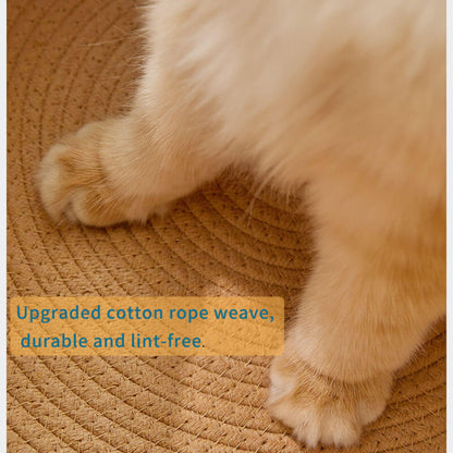 Close-up of upgraded cotton rope weave inner lining of pet bed, showing durable, lint-free texture with cat paws resting on it for scratch-resistant comfort.