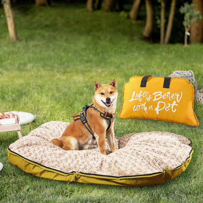 Shiba Inu resting on a plush, waterproof dog bed mat on a grassy lawn, with a yellow "Life is Better with a Pet" carry bag beside it, ideal for camping, hiking, and outdoor adventures.