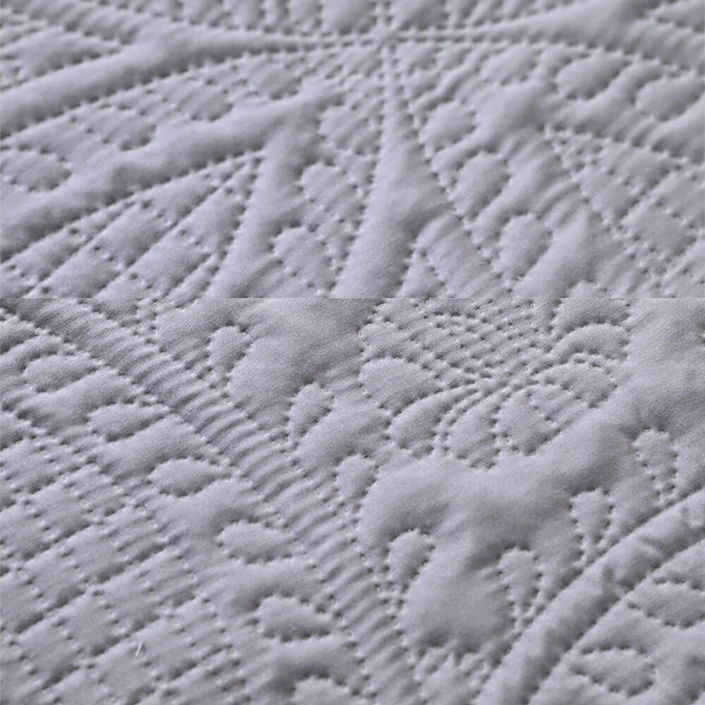 Close-up of premium quilted pet mat fabric showing intricate stitching, soft texture, and breathable design, highlighting durability and comfort for year-round use
